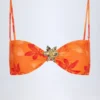 Baracoa Top de bikini cu gât halter și detalii metalice, cu imprimeu de orhidee portocalii Baracoa Top de bikini cu gât halter și detalii metalice, cu imprimeu de orhidee portocalii