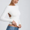 Bluză albă cu guler înalt, mâneci lungi și spate decupat, din modal, model Elli Bluză albă cu guler înalt, mâneci lungi și spate decupat, din modal, model Elli