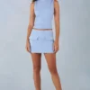 Bluză cu guler înalt din imitație de piele de căprioară Aurelle, de culoare albastru deschis Bluză cu guler înalt din imitație de piele de căprioară Aurelle, de culoare albastru deschis