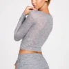Bluză cu mâneci lungi și decolteu adânc din jersey transparent Liah, în culoarea gri Bluză cu mâneci lungi și decolteu adânc din jersey transparent Liah, în culoarea gri