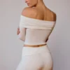 Bluză transparentă cu umerii goi și mâneci lungi, de culoare alb moale Bluză transparentă cu umerii goi și mâneci lungi, de culoare alb moale