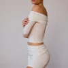 Bluză transparentă cu umerii goi și mâneci lungi, de culoare alb moale Bluză transparentă cu umerii goi și mâneci lungi, de culoare alb moale