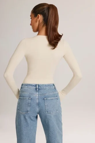 Body Elodie Modal cu mâneci lungi și decolteu adânc, în culoarea Ivory