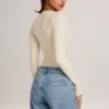 Body Elodie Modal cu mâneci lungi și decolteu adânc, în culoarea Ivory Body Elodie Modal cu mâneci lungi și decolteu adânc, în culoarea Ivory