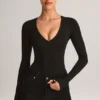 Body-ul cu mâneci lungi și decolteu adânc Elodie Modal, negru Body-ul cu mâneci lungi și decolteu adânc Elodie Modal, negru