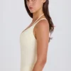Body-ul din jersey de bumbac elastic, cu spate încrucișat, în nuanța crem Body-ul din jersey de bumbac elastic, cu spate încrucișat, în nuanța crem