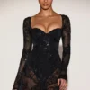 Body-ul mini corset Jovie din plasă transparentă cu ornamente, în culoarea neagră Body-ul mini corset Jovie din plasă transparentă cu ornamente, în culoarea neagră
