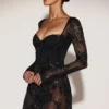 Body-ul mini corset Jovie din plasă transparentă cu ornamente, în culoarea neagră Body-ul mini corset Jovie din plasă transparentă cu ornamente, în culoarea neagră