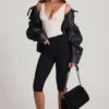 Body Zayla din dantelă transparentă cu decolteu adânc și margini festonate, în culoarea albă Body Zayla din dantelă transparentă cu decolteu adânc și margini festonate, în culoarea albă