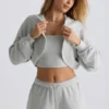 Bolero scurt cu glugă din jersey periat, culoare gri ceață Bolero scurt cu glugă din jersey periat, culoare gri ceață