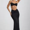 Braletă Jerika din jersey elastic cu detalii metalice și gât halter, în negru Braletă Jerika din jersey elastic cu detalii metalice și gât halter, în negru