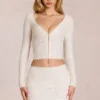 Cardigan decoltat din dantelă Odelia, de culoare ivoriu Cardigan decoltat din dantelă Odelia, de culoare ivoriu