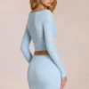 Cardigan Odelia din dantelă cu decolteu adânc, în albastru pudră Cardigan Odelia din dantelă cu decolteu adânc, în albastru pudră