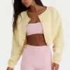 Cardigan scurt din jersey periat, cu nasturi, în galben deschis Cardigan scurt din jersey periat, cu nasturi, în galben deschis