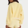Cardigan scurt din tricot cu nasturi, în nuanța galben deschis Cardigan scurt din tricot cu nasturi, în nuanța galben deschis