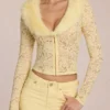 Cardigan Solaya din dantelă cu bordură din blană artificială, în culoarea galben lămâie Cardigan Solaya din dantelă cu bordură din blană artificială, în culoarea galben lămâie