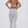 Colanți evazați Soft Active cu buzunare și talie în V, în culoarea gri Colanți evazați Soft Active cu buzunare și talie în V, în culoarea gri