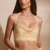 Corset cu guler înalt și ornamente Selena, în culoarea auriu Corset cu guler înalt și ornamente Selena, în culoarea auriu