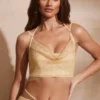 Corset cu guler înalt și ornamente Selena, în culoarea auriu Corset cu guler înalt și ornamente Selena, în culoarea auriu