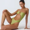 Costum de baie bandeau cu decupaje și ornamente din mărgele, în culoarea verde pară Costum de baie bandeau cu decupaje și ornamente din mărgele, în culoarea verde pară