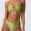 Costum de baie bandeau cu decupaje și ornamente din mărgele, în culoarea verde pară Costum de baie bandeau cu decupaje și ornamente din mărgele, în culoarea verde pară