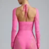 Costum de baie Melody cu decupaje și ornamente, în roz gumă de mestecat Costum de baie Melody cu decupaje și ornamente, în roz gumă de mestecat