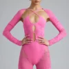 Costum de baie Melody cu decupaje și ornamente, în roz gumă de mestecat Costum de baie Melody cu decupaje și ornamente, în roz gumă de mestecat