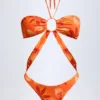 Costum de baie întreg cu decupaje și gât halter Maranta, cu imprimeu Orange Orchid Costum de baie întreg cu decupaje și gât halter Maranta, cu imprimeu Orange Orchid