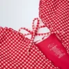 Costum de baie întreg cu decupaje și volane Montjoi, cu gât halter, în carouri roșii Costum de baie întreg cu decupaje și volane Montjoi, cu gât halter, în carouri roșii