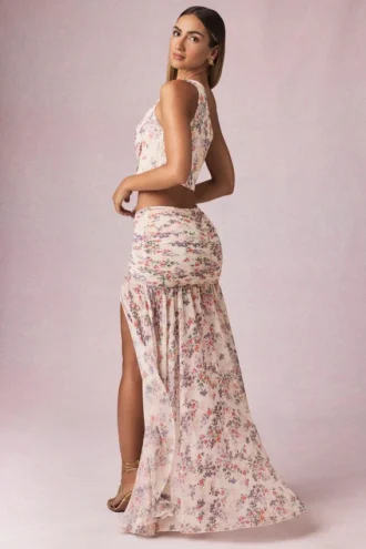 Fustă maxi asimetrică cu volane Romy, cu imprimeu floral Primrose Fustă maxi asimetrică cu volane Romy, cu imprimeu floral Primrose