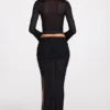 Fustă maxi drapată din jersey transparent, cu talie joasă, model Diana, în culoarea neagră Fustă maxi drapată din jersey transparent, cu talie joasă, model Diana, în culoarea neagră