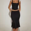 Fustă midi din dantelă Fjolla, cu talie medie și pliuri, în culoarea negru Fustă midi din dantelă Fjolla, cu talie medie și pliuri, în culoarea negru