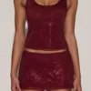 Fustă mini A-line cu talie medie și ornamente Asta, în culoarea burgund Fustă mini A-line cu talie medie și ornamente Asta, în culoarea burgund