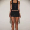 Fustă mini A-line cu talie medie și ornamente Asta, negru Fustă mini A-line cu talie medie și ornamente Asta, negru