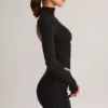 Fustă mini Cali din modal cu volane, talie medie, în negru Fustă mini Cali din modal cu volane, talie medie, în negru