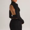 Fustă mini Cali din modal cu volane, talie medie, în negru Fustă mini Cali din modal cu volane, talie medie, în negru