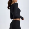 Fustă mini cu talie joasă și detalii cu nasturi, model Dalla, din modal, negru Fustă mini cu talie joasă și detalii cu nasturi, model Dalla, din modal, negru