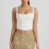 Fustă mini cu talie joasă și ornamente Jianna, în culoarea auriu Fustă mini cu talie joasă și ornamente Jianna, în culoarea auriu