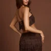 Fustă mini cu talie medie și franjuri Maristella, în culoarea ciocolată Fustă mini cu talie medie și franjuri Maristella, în culoarea ciocolată