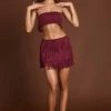 Fustă mini cu talie medie și franjuri Maristella, în culoarea roșu vin Fustă mini cu talie medie și franjuri Maristella, în culoarea roșu vin