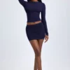 Fustă mini cu talie medie și volane din material Cali Modal, culoare albastru închis Fustă mini cu talie medie și volane din material Cali Modal, culoare albastru închis