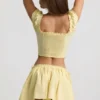 Fustă mini din poplin de bumbac cu volane Maira, galben lămâie Fustă mini din poplin de bumbac cu volane Maira, galben lămâie