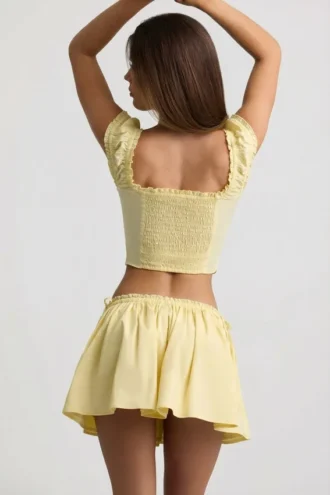 Fustă mini din poplin de bumbac cu volane Maira, galben lămâie
