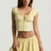 Fustă mini din poplin de bumbac cu volane Maira, galben lămâie Fustă mini din poplin de bumbac cu volane Maira, galben lămâie
