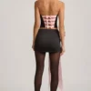 Fustă mini din satin Carola cu detaliu fundă și talie joasă, în culoarea negru Fustă mini din satin Carola cu detaliu fundă și talie joasă, în culoarea negru