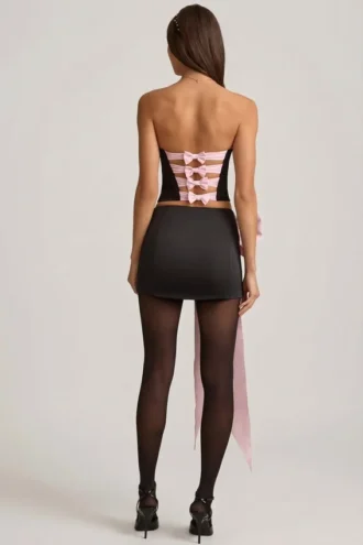 Fustă mini din satin Carola cu detaliu fundă și talie joasă, în culoarea negru