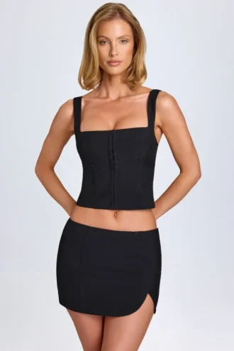 Fustă mini Issa cu talie joasă și croi curbat, în culoarea negru Fustă mini Issa cu talie joasă și croi curbat, în culoarea negru