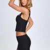 Fustă mini Issa cu talie joasă și croi curbat, în culoarea negru Fustă mini Issa cu talie joasă și croi curbat, în culoarea negru