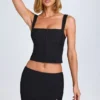 Fustă mini Issa cu talie joasă și croi curbat, în culoarea negru Fustă mini Issa cu talie joasă și croi curbat, în culoarea negru