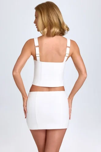 Fustă mini Issa Curved cu talie joasă, în culoarea albă Fustă mini Issa Curved cu talie joasă, în culoarea albă